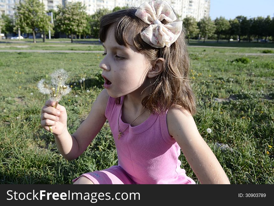 Girl with dandelion