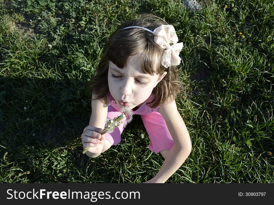 Girl with dandelion