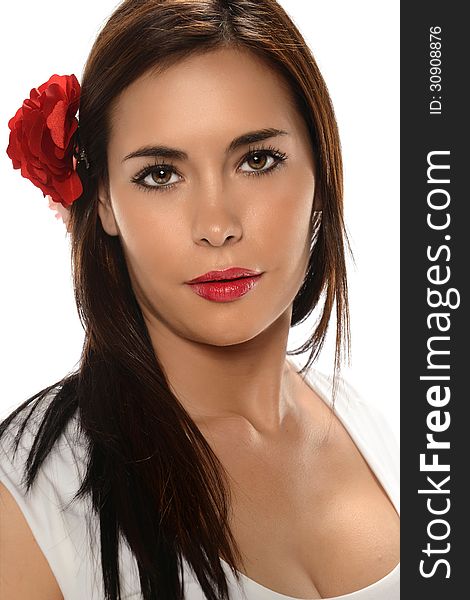 Portrait of young Hispanic woman with rose on her hair. Portrait of young Hispanic woman with rose on her hair