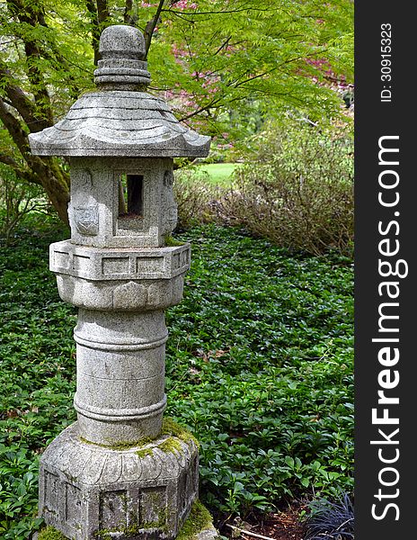 Japanese shrine in green garden park