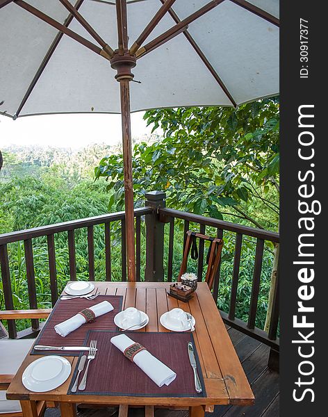 Restaurant table in a tropical resort. Restaurant table in a tropical resort