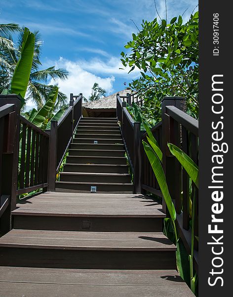 Wooden stairs in a tropical resort