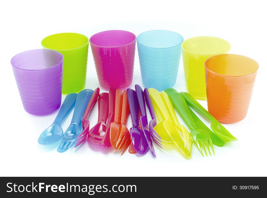 Plastic fork spoon and knife set on white background