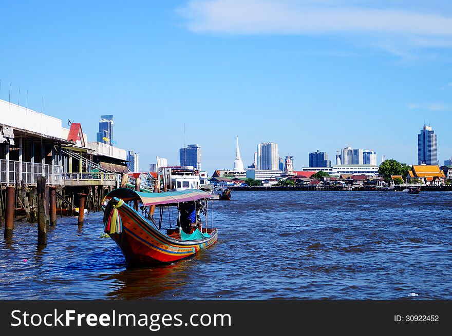 Main river of Bangkok is Chaopraya river with taxi boat.