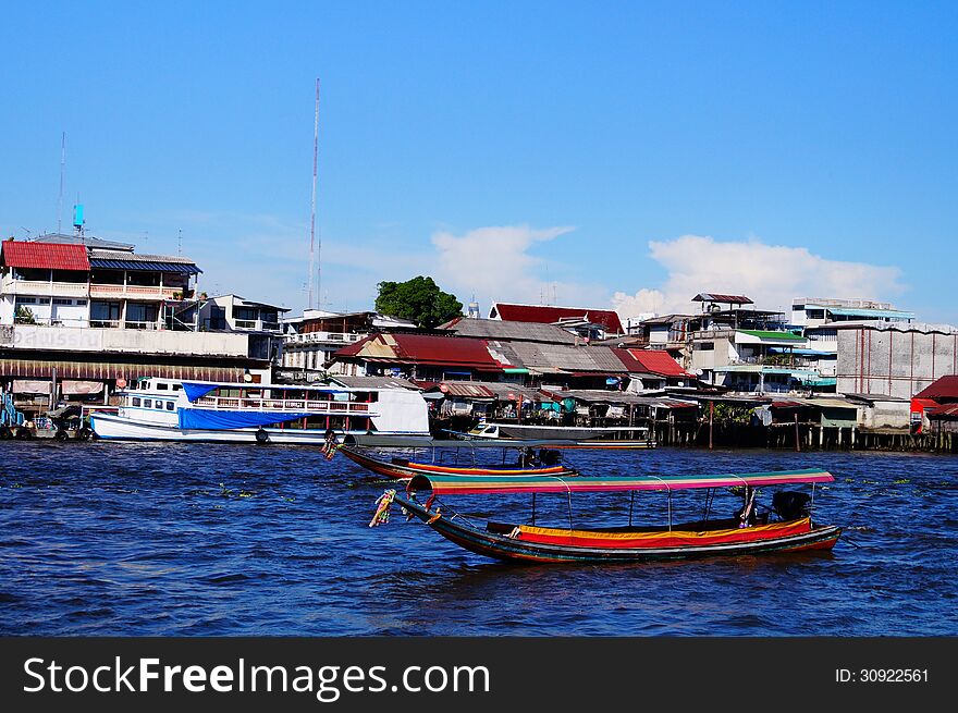 Chaopraya river is the main river of Bangkok in Thailand and there are many boats for travelling. Chaopraya river is the main river of Bangkok in Thailand and there are many boats for travelling