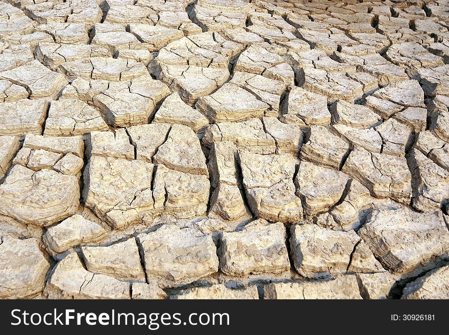 Cracked and dry land due to drought. Cracked and dry land due to drought