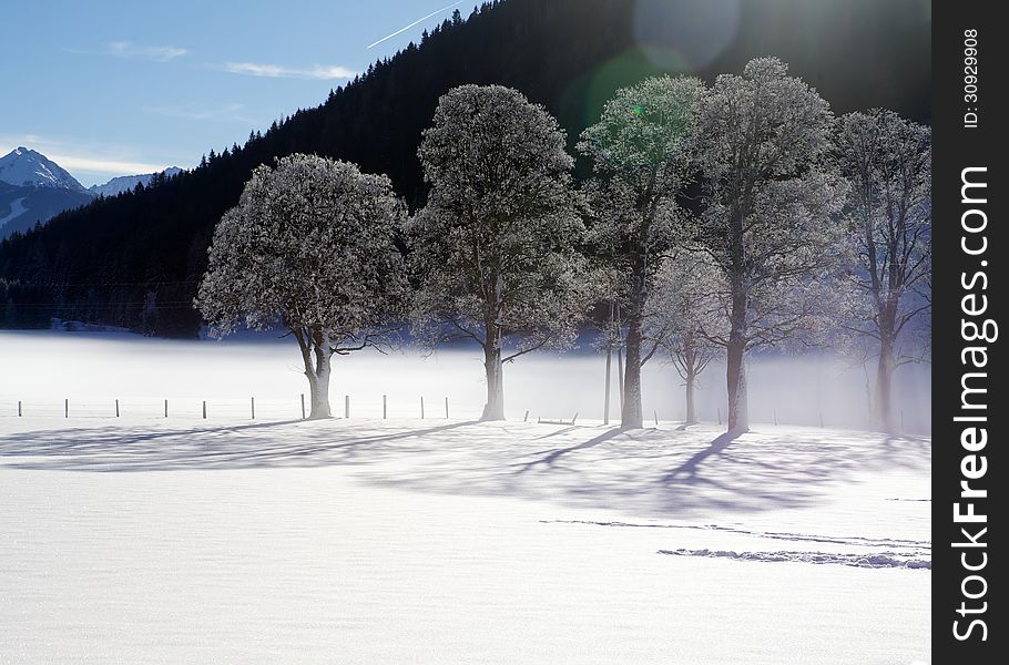 Ramsau am Dachstein in morning, fog in valley