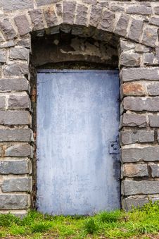 Stone Wall With Arch And Metal Door Stock Images Stone Wall With Arch And Metal Door Stock Images