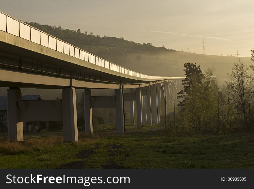 Bridge In The Mountains During Sunrise