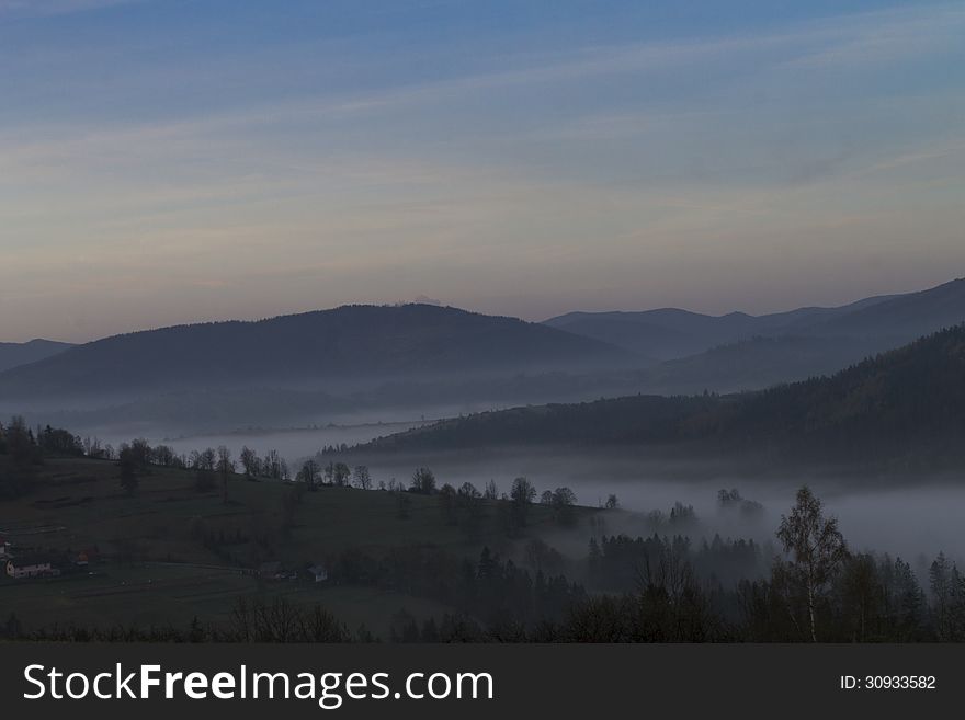 Morning fog in the mountains in Southern Poland