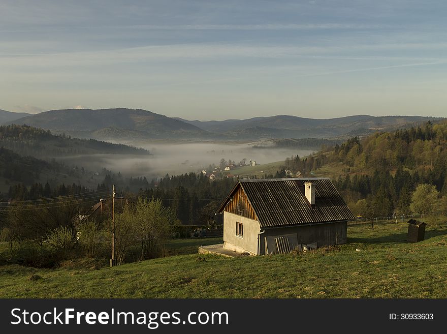 Morning fog in the mountains in Southern Poland