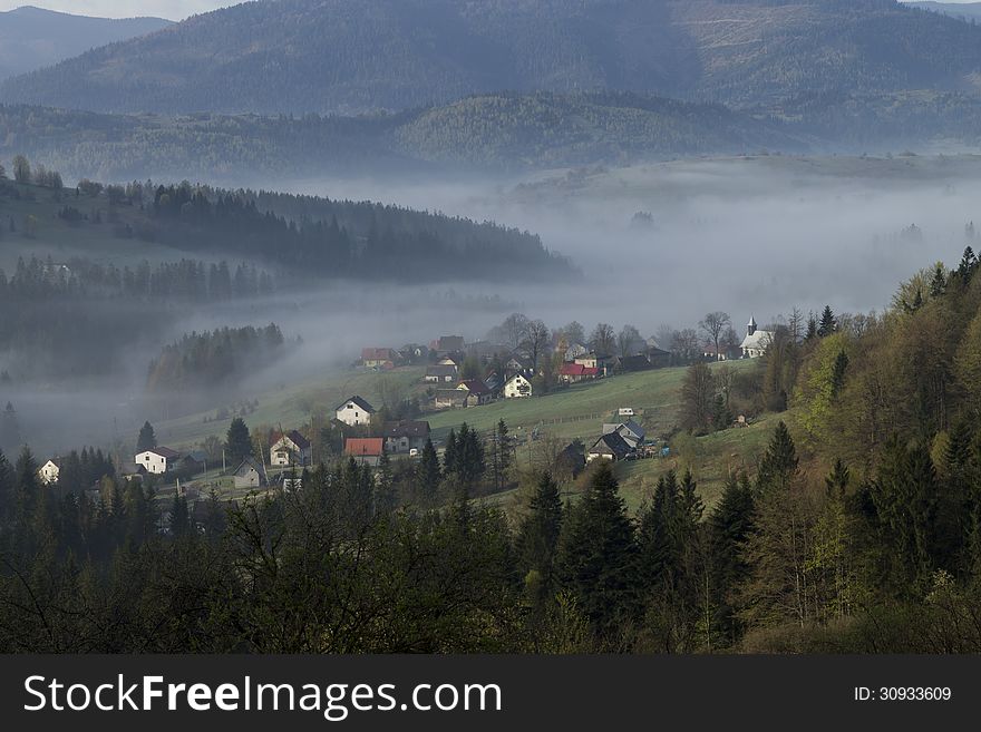 Morning fog in the mountains in Southern Poland