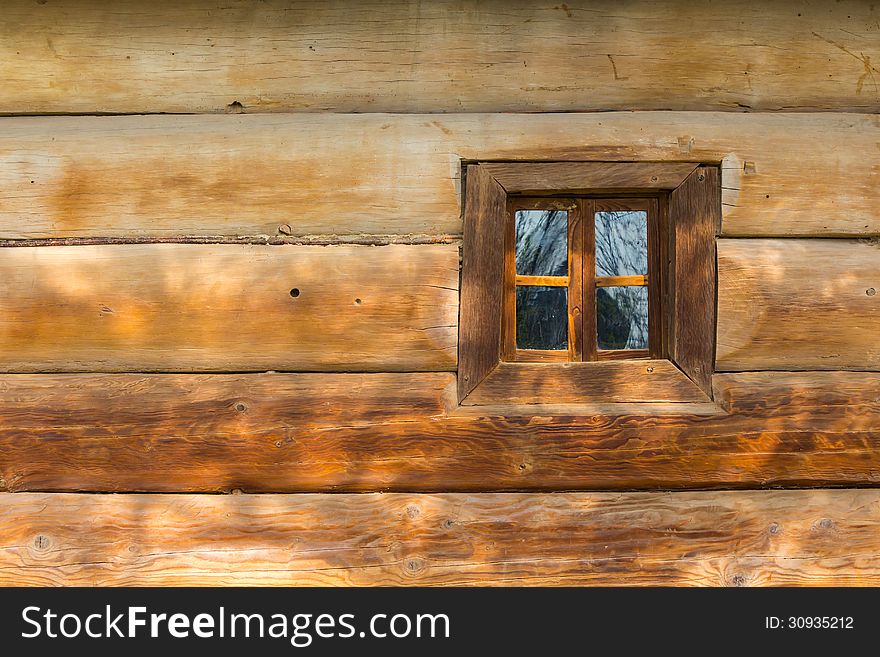 Window of the old wooden house. Window of the old wooden house