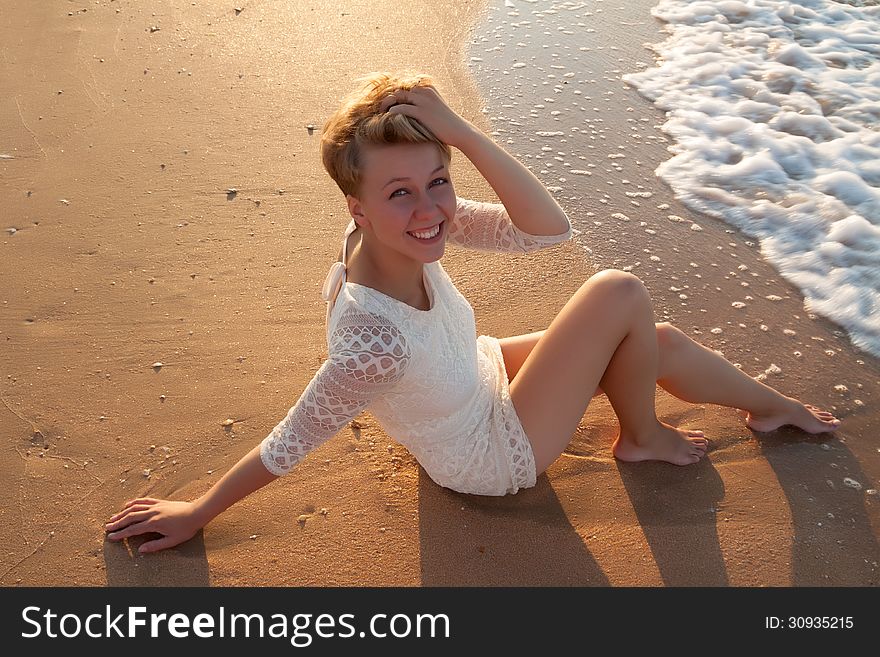 Smiling girl at summer sea beach. Smiling girl at summer sea beach