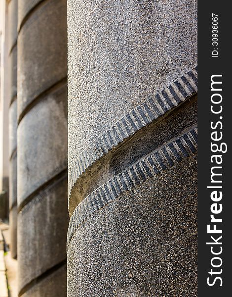 Gallery thick concrete columns with a spiral pattern. Gallery thick concrete columns with a spiral pattern