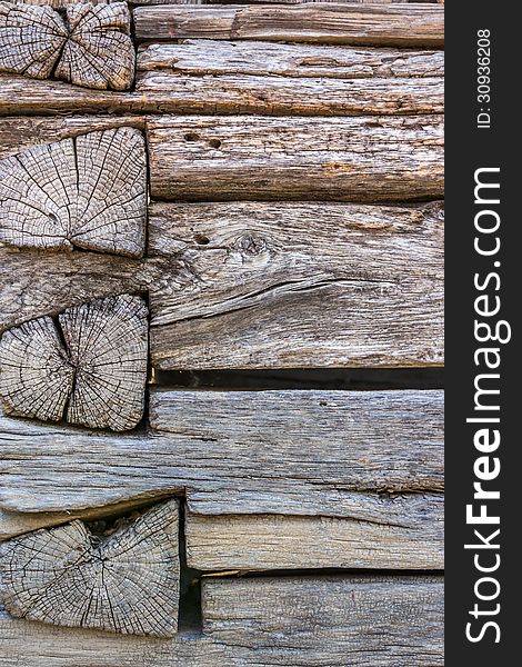 Old cracked weathered wooden wall