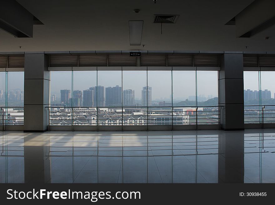 The floor-to-ceiling windows where can watching the city