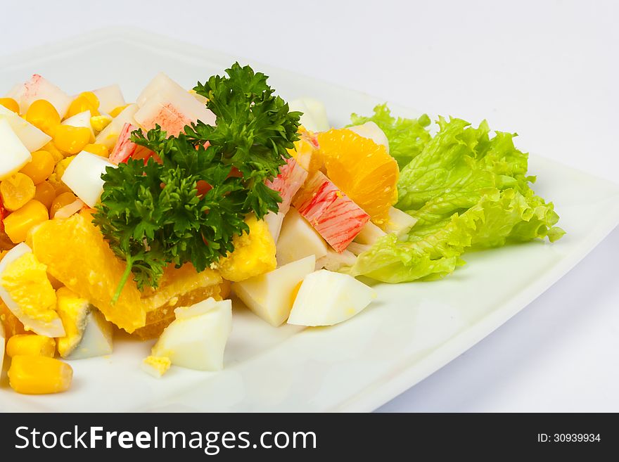 Egg salad with sweet corn and crab sticks. Egg salad with sweet corn and crab sticks