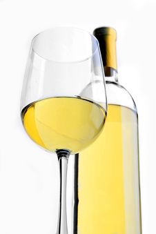 A Glass Of White Wine With A Wine Bottle Royalty Free Stock Images A Glass Of White Wine With A Wine Bottle Royalty Free Stock Images