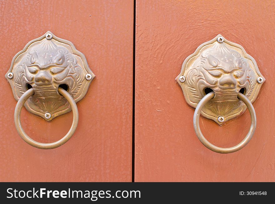 Chinese doorknob on door background. Chinese doorknob on door background