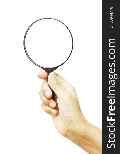 Hand holding magnifying glass isolated on white background
