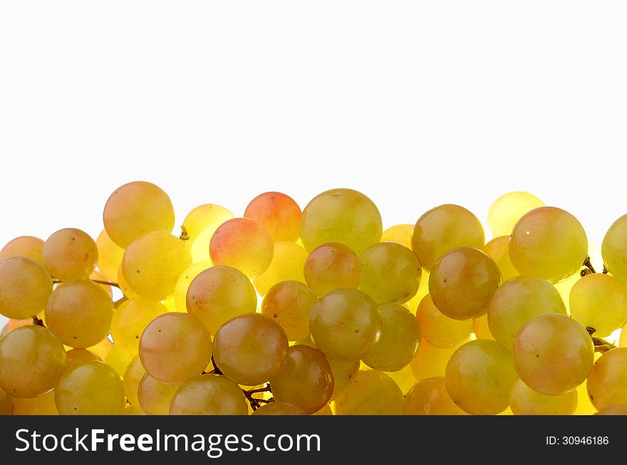 Close up of a bunch of fresh green grapes on isolated on a white background. Close up of a bunch of fresh green grapes on isolated on a white background.