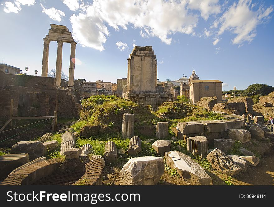 Taking a stroll on the ruins of Foro Romano on a sunny day. Taking a stroll on the ruins of Foro Romano on a sunny day
