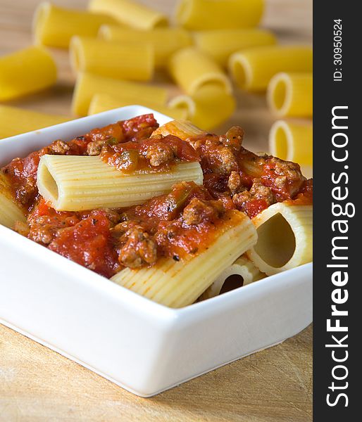 Rigatoni pasta tube with meat sauce