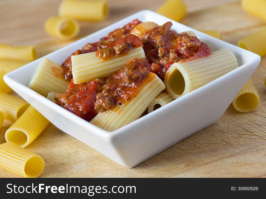 Rigatoni pasta tube with meat sauce