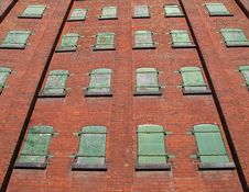 Green Metal Windows On Brick Wall. Stock Photography Green Metal Windows On Brick Wall. Stock Photography