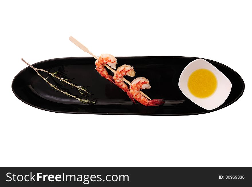 Three shrimps on stick with souce and fresh herb. Three shrimps on stick with souce and fresh herb