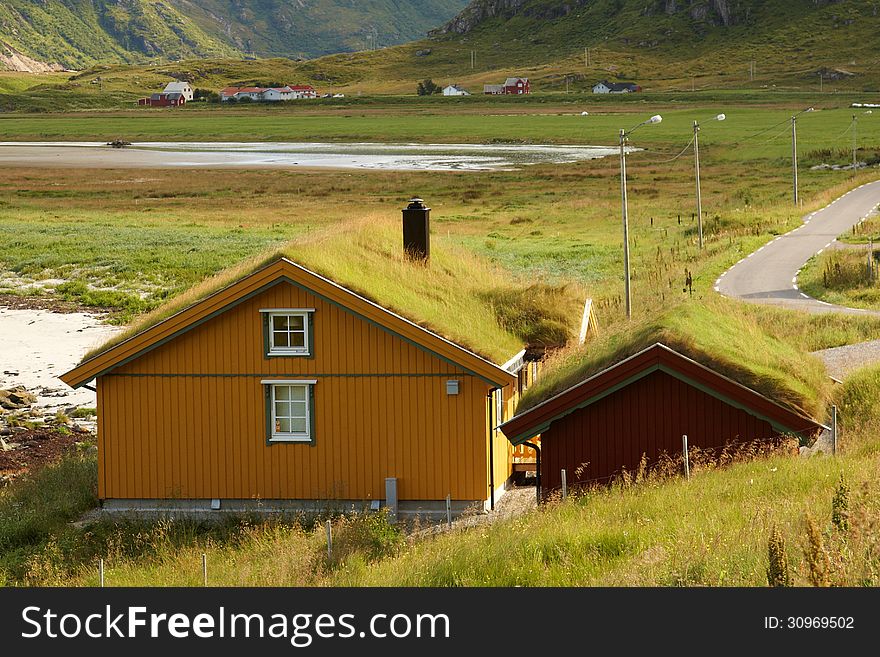 Houses with typical sod roof on Lofotten islands in Norway. Houses with typical sod roof on Lofotten islands in Norway