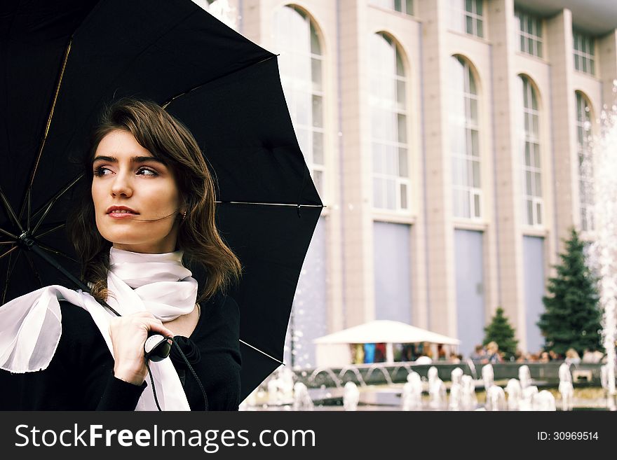 Beautiful Girl With An Umbrella