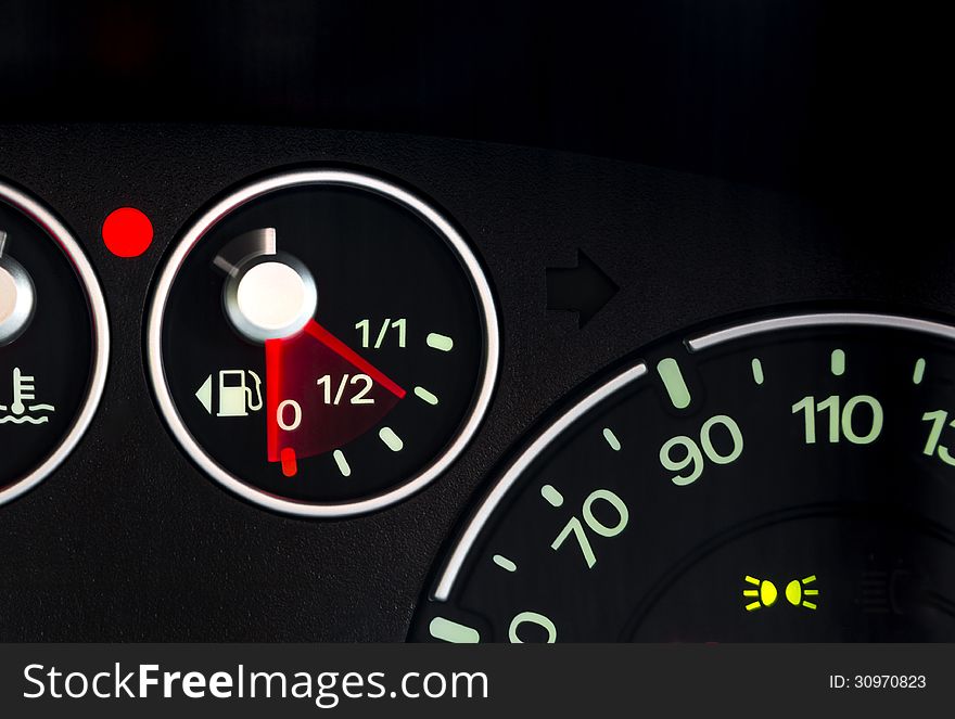 Fast dropping fuel gauge on instrument panel. Fast dropping fuel gauge on instrument panel