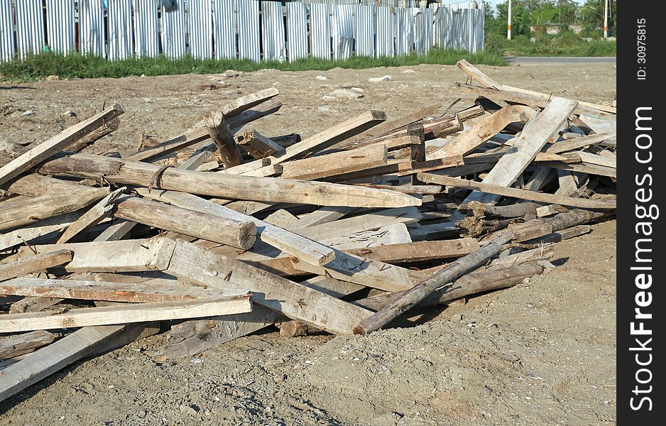 Pile of used lumber from construction