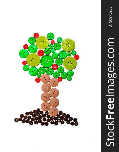 Green and brown buttons arranged to resemble a tree. Red buttons act as apples. Green and brown buttons arranged to resemble a tree. Red buttons act as apples.