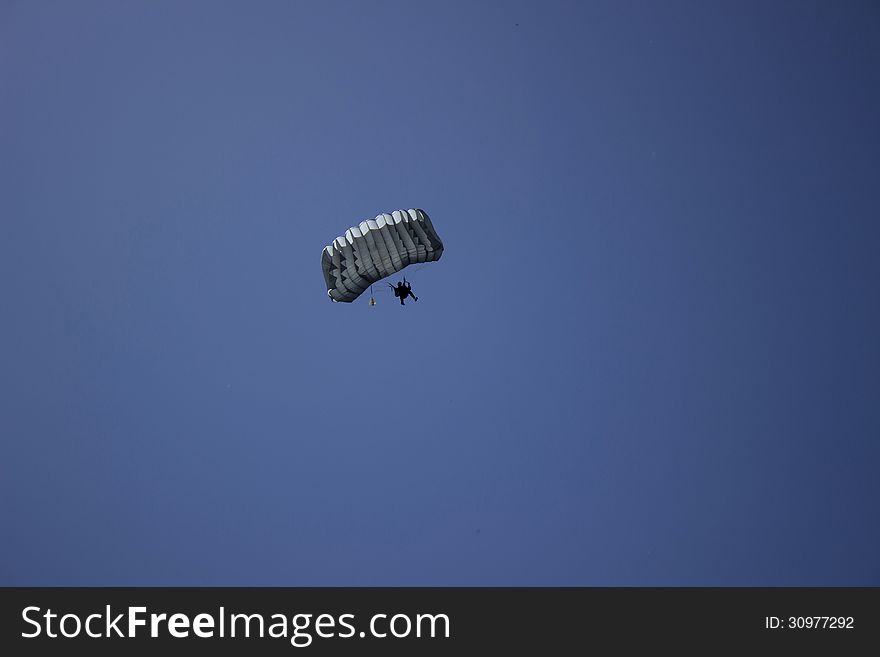 Paratrooper and parachute jump from plane