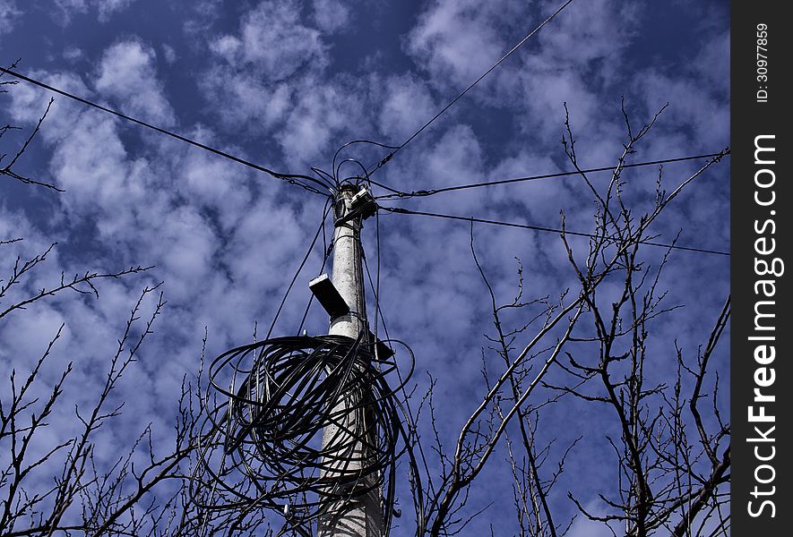 Telecommunication pole and wire in the sky