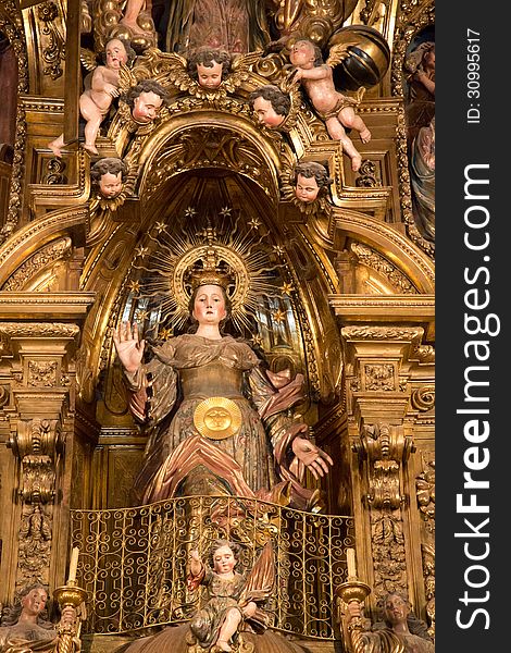 Famous gilded altar in the church of Santa Maria de Cadaques. This golden work of art is visited by pilgrims all over the world and serves as a perfect example of baroque style 16th century iconography