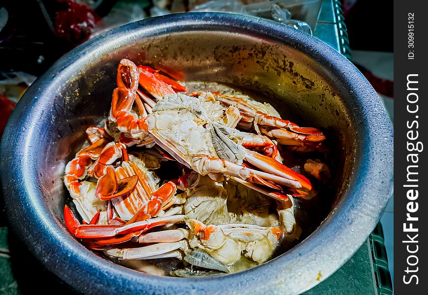 crab that has been boiled with spices and added to the pan