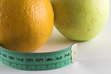 Apple, Orange And Tape Royalty Free Stock Images Apple, Orange And Tape Royalty Free Stock Images