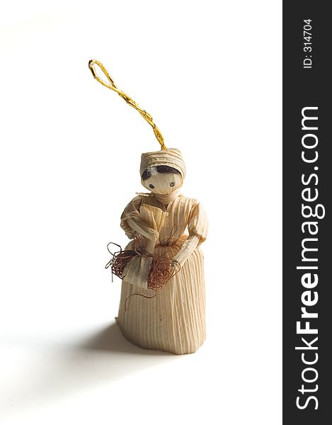 A small paper ornament of a peasant woman. A small paper ornament of a peasant woman.