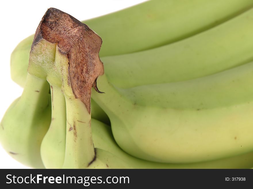 Green bananas close-up