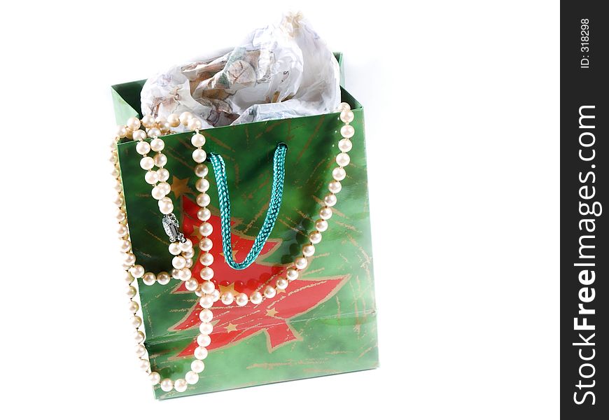 Isolated gift bag with pearls