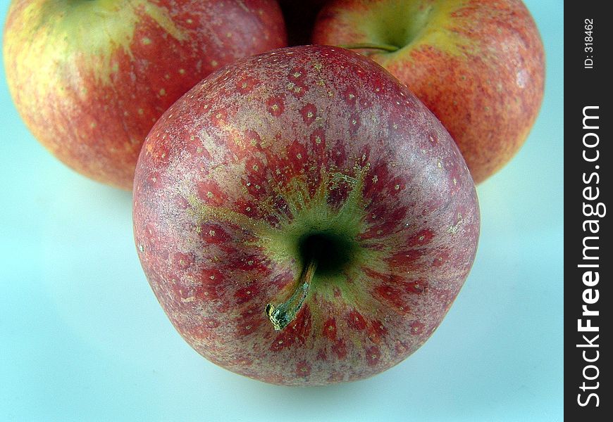 Front view of three apples. Front view of three apples