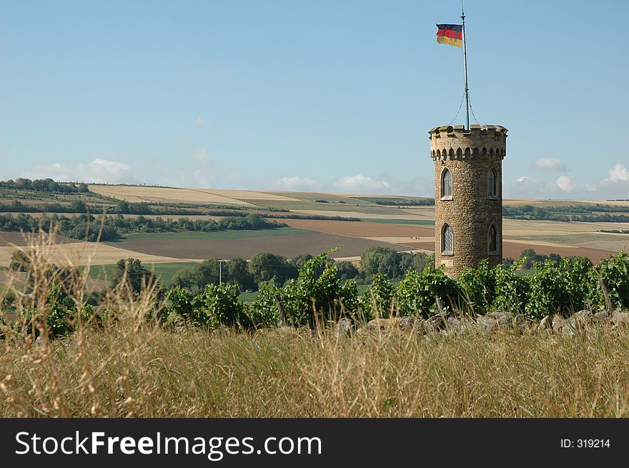 Stone Tower And Fields