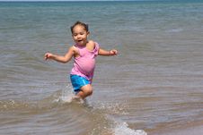 Running In The Waves Royalty Free Stock Photo Running In The Waves Royalty Free Stock Photo
