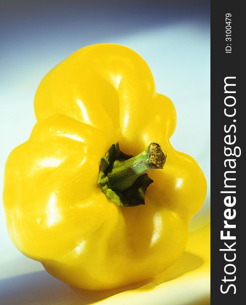 Yellow pepper on a white background