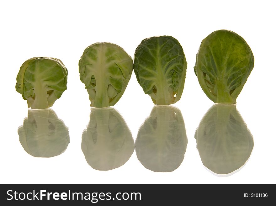 Brussels sprouts isolated over white background. Brussels sprouts isolated over white background