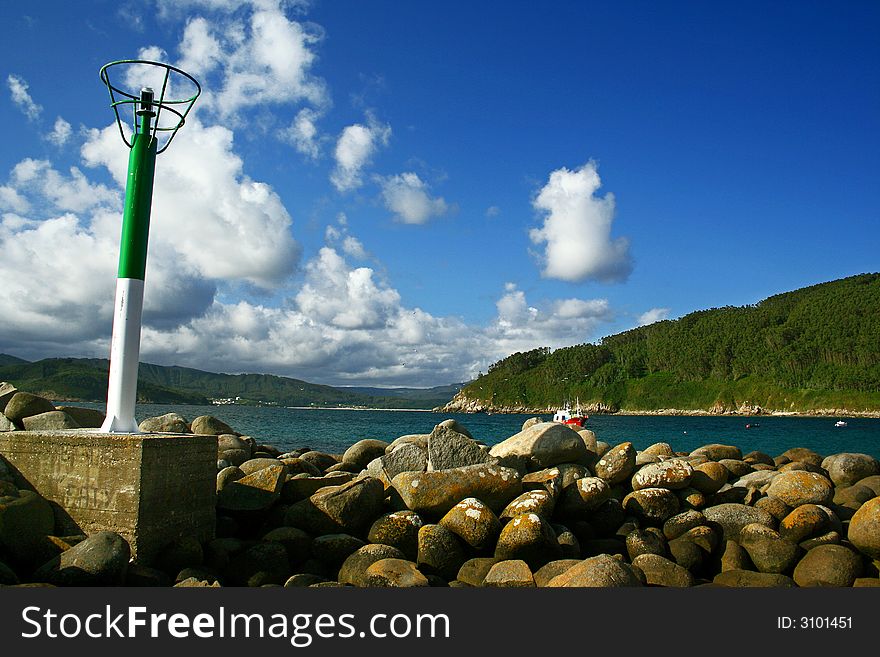 Lighthouse and stones